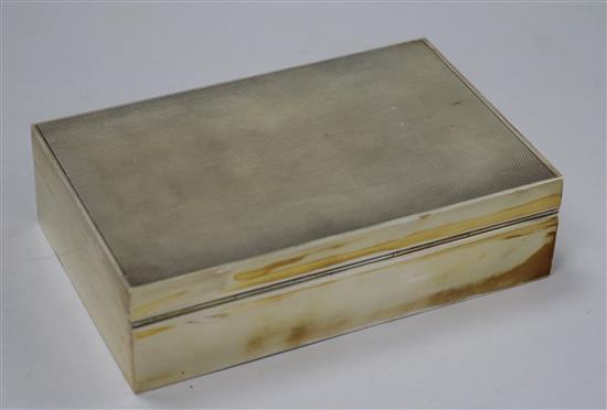 An early 1950s Asprey & Co engine turned silver rectangular cigarette box, 14cm.